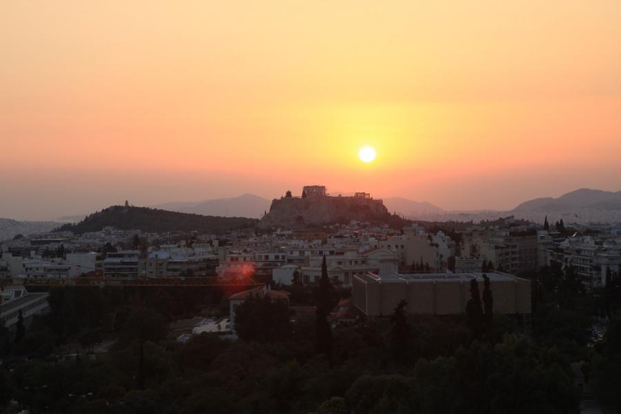 Sunset view of the Acropolis from the balconies of Hilton Hotel. - by adampao 
