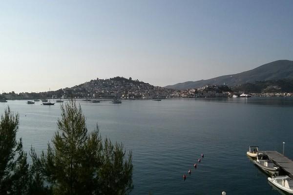 Poros Island early in the morning..  looking at Poros Island from behind - by Kiki 